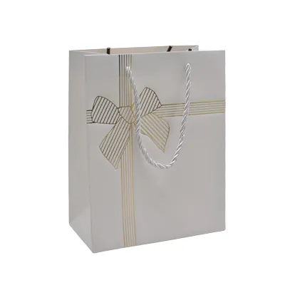 Sacs pelliculés blancs embossés nœud or poignées cordelette 18+10x23 cm 210g/m² – Paquet de 20 - Sacs pelliculés à motifs