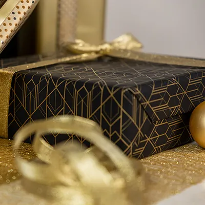 Papier cadeau Art Grafik couché blanc 30 cm x 50 m, noir / or, 80 g/m² - Papier cadeaux couchés à motifs-1